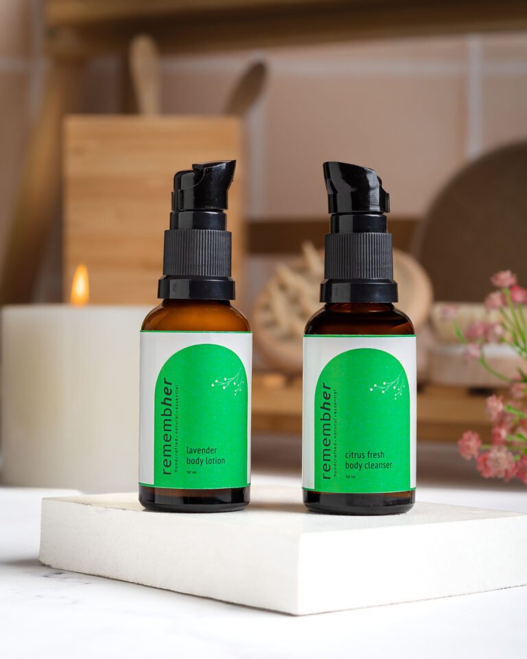 Minimalist skincare product photography for Remembher highlighting the cream bottle and natural ingredients, shot by NiRam Creatives Bangalore.